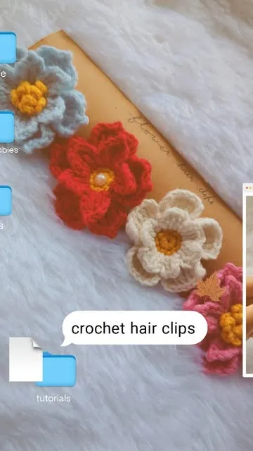 Crochet flower hair clips in blue, red, white and pink